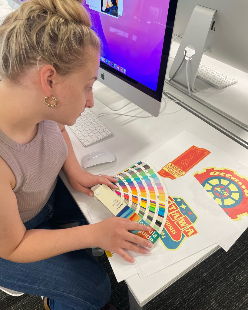 A women color matching her logos